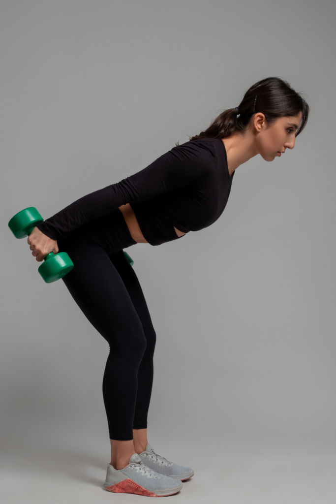 woman working on tone Arms with dumbbells