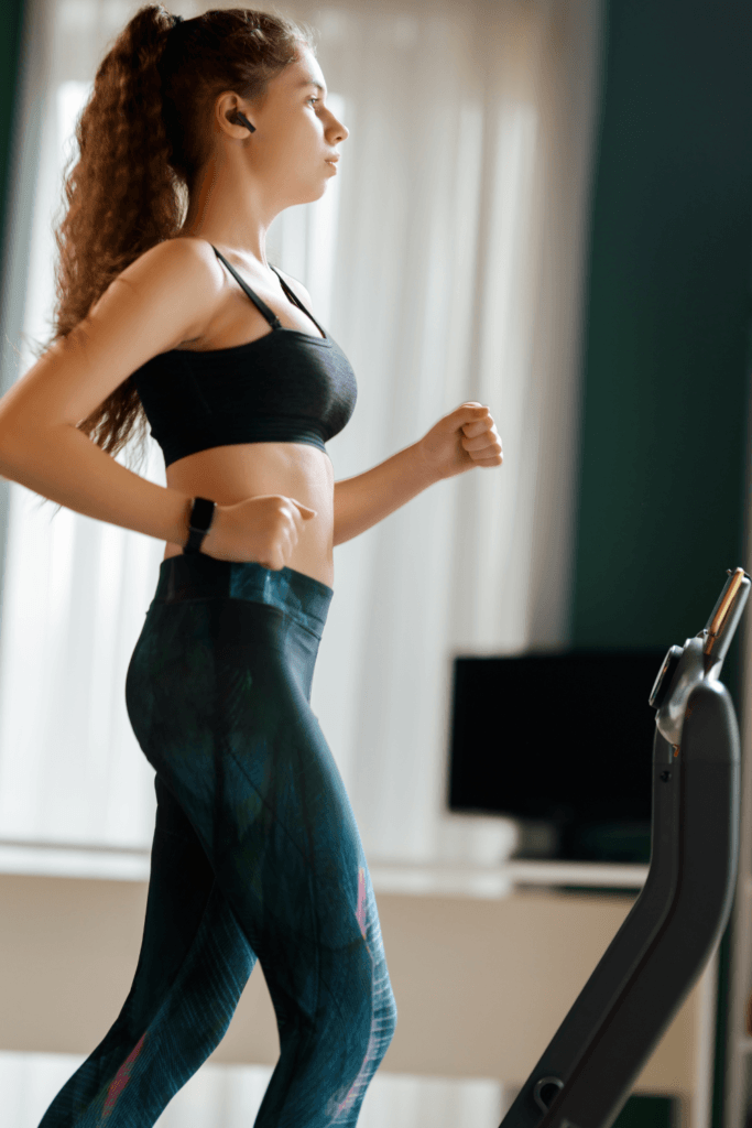 woman walking on a walking pad