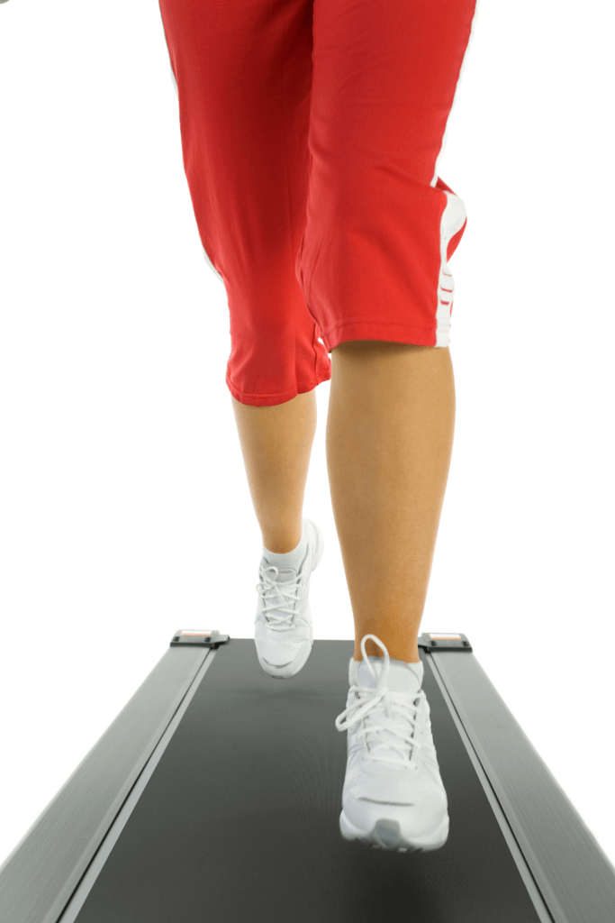 woman working out on a walking pad