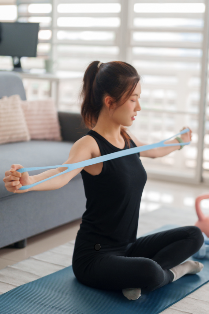 woman working out with a resistance band