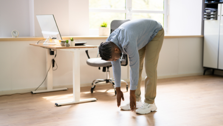 man stretching in home