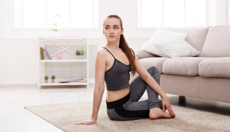 woman stretching at home