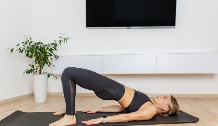woman stretching at home