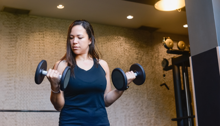 woman working out wearing a workout top