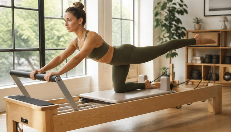 woman working out on a Pilates Reformer at home